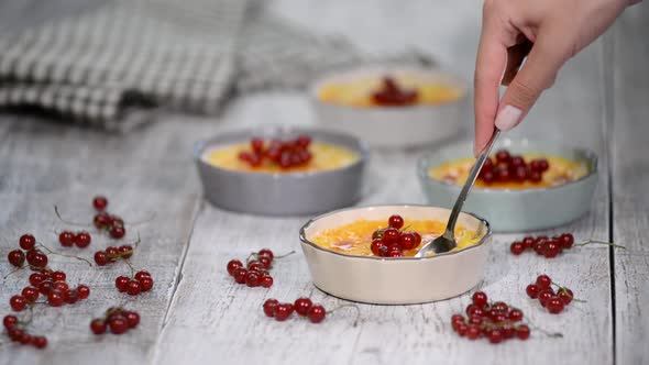 Creme brulee, French vanilla cream dessert with caramelised sugar on top alt