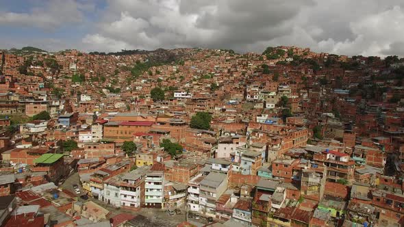 Flying Over Petare at Sunset alt
