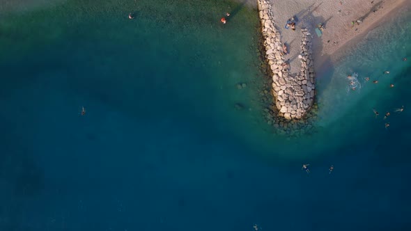 Vertical View of the Sea Coast From Drone at Sunset