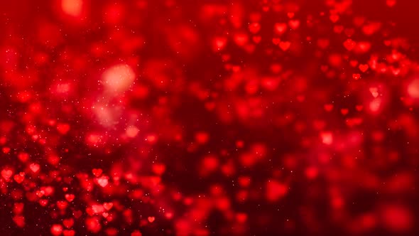 Abstract red hearts on dark background.