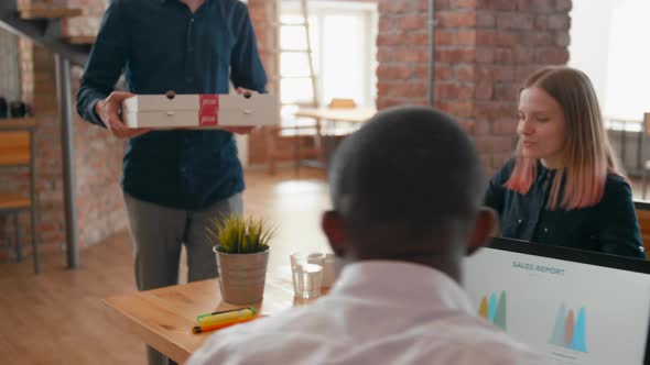 Food Delivery Service: Worker Brings Pizza To Office for Lunch of Diverse Team