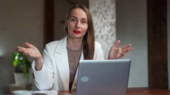 Happy Woman Using Video Chat in Modern Office View From Web Camera alt