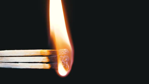 Three Matches Are Lit a Flame on a Black Background and Then Goes Out Creating a Lot of Smoke alt