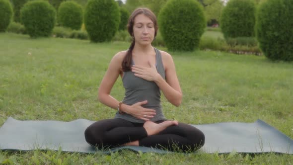 Yoga Instructor Young Woman Deep Breathing Ardha Padmasana Half Lotus Cross Legged Sitting Posture