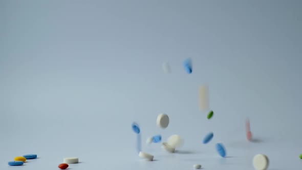 Pills Fall in Slow Motion alt