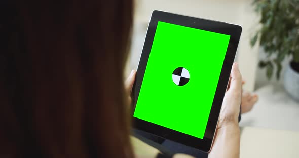 Woman Holding Tablet Chromakey Indoorss