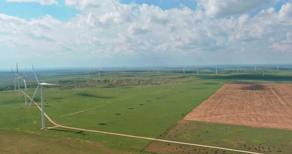 Wind Turbines of Many Windmill Renewable Energy a Field in Southeast Texas alt