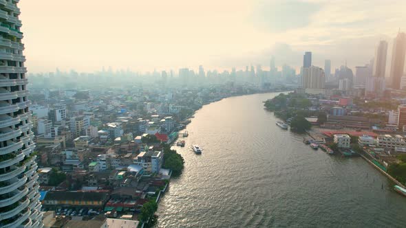 4K : Aerial city view of Bangkok downtown, Flying over Bangkok, Thailand. alt