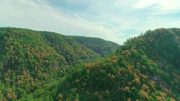 Aerial Video of Clouds Mountains Forest and Mountain River alt