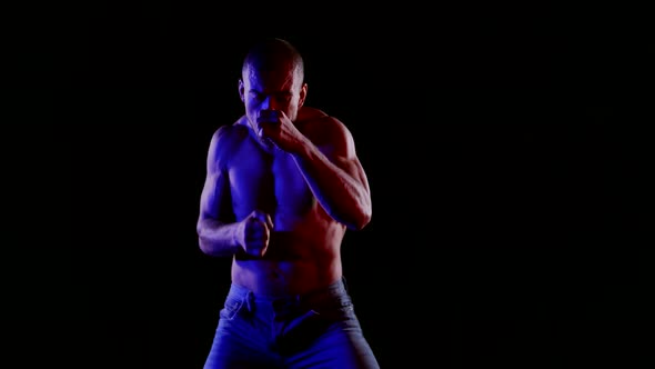 Lonely Fighter is Fighting in Darkness Training and Preparing to Sparring alt