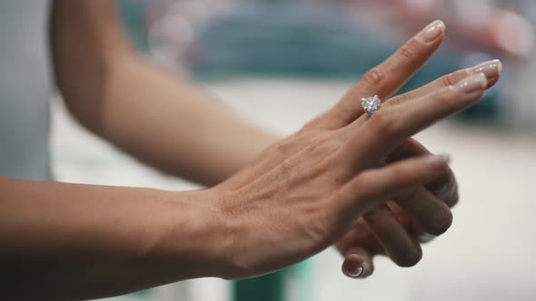 Woman Trying on a Diamond Ring alt