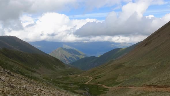 Timelapse scene in mountains of national park of Dombay, Caucasus, Russia