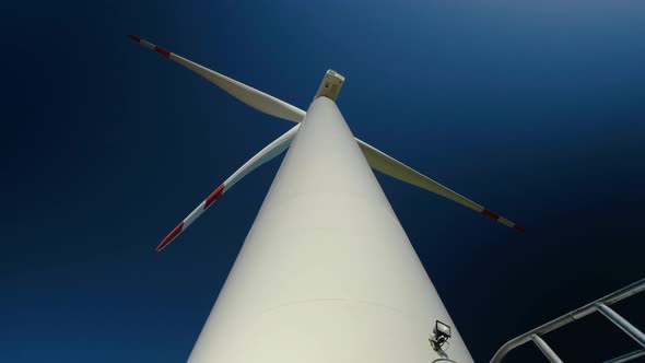 Motion Past Wind Turbine Post with Technical Ground To Blade