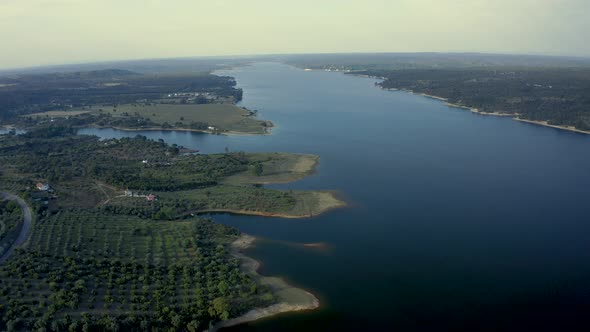 Golden Sunset Over The Large fluvial beach At The Vast Rural Area Of Alentejo alt