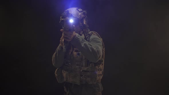 US Special Forces Soldier Aiming with Rifle at Night in Darkness alt