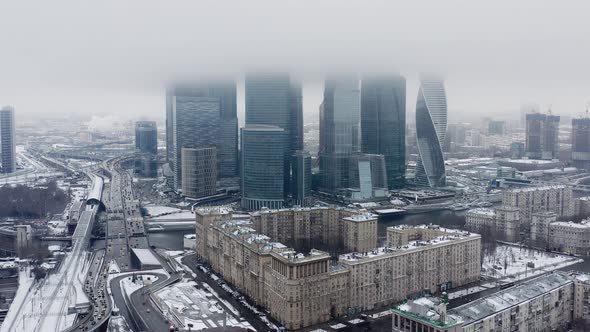 Aerial Drone Shot of Moscow City Skyscrapers at Cloudy Winter Day alt
