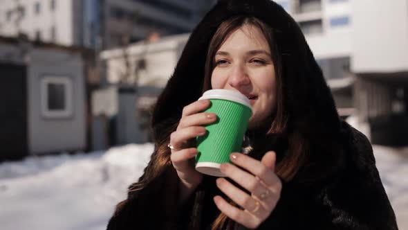 Girl in a Fur Coat Winter Warm Aromatic Coffee