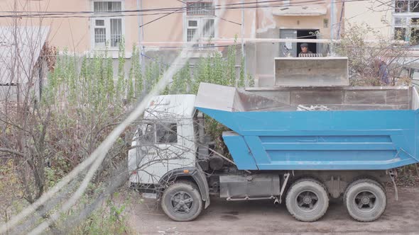 Garbage collection with heavy equipment alt