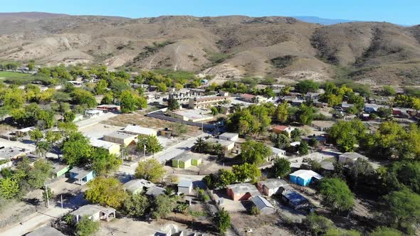 Small Town Near Trees And Mountains