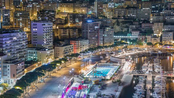 Seaside Swimming Pool in Monaco Night Timelapse Buildings in the Background alt