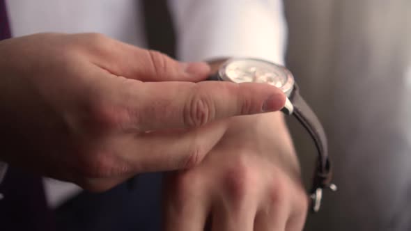 a Man Puts on a Watch Nv Hand alt