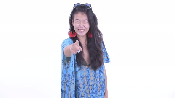 Happy Beautiful Asian Tourist Woman Pointing at Camera alt
