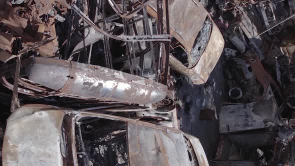 Vertical Video of a Dump of Wardestroyed Cars in Ukraine alt