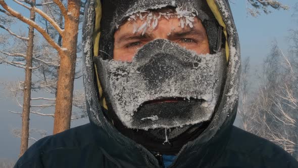 Close-up of the Frozen Face of a Young Happy Man