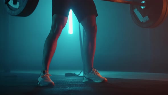 Heavy Barbell is Falling on Floor of Gym During Training of Powerlifter Dramatic Shot in Sport Hall alt