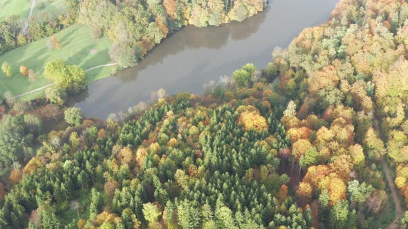 Aerial Above Lake with Autumn Foliage and Tree Reflections in Styria Thal Austria alt