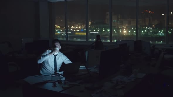 Working in Office at Night alt