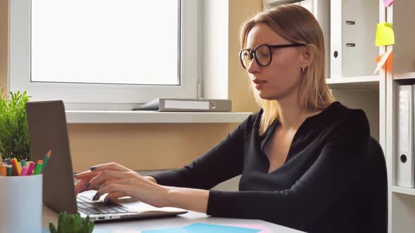 Successful Businesswoman Finalizing Project  Video Prores alt