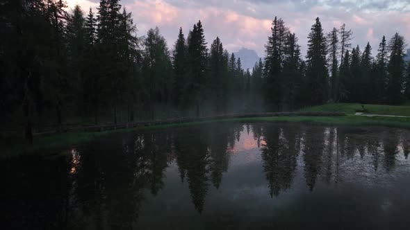 Mountain lake in the Dolomites with Tre Cime di Lavaredo reflection alt