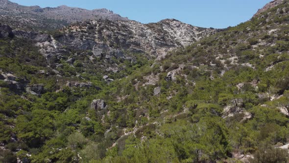 Greece Crete Landscape with Olive Trees and Tiny Mountain Village alt