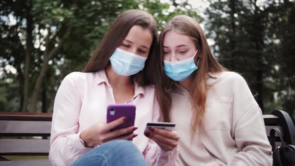 Freelance women online shopping. Young Girls using smart phone. alt