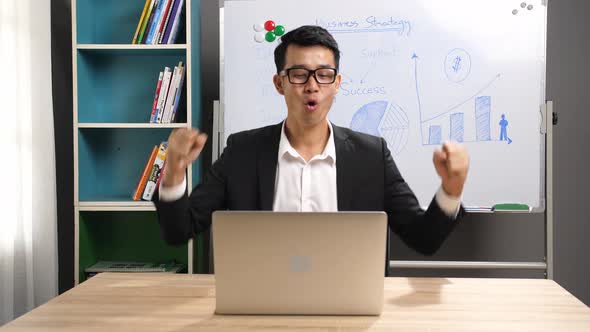 Happy Businessman Working With Computer At Home alt