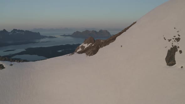 Skier On A Mountainside From A Distance