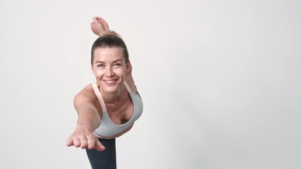 Woman Performing Yoga Dancers Pose