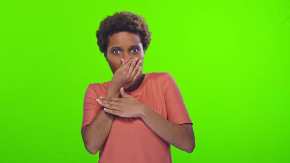 Young African American Woman Feels Bad Odor and Waves Hand to Disperse Stench alt