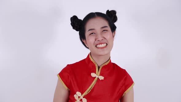 happy woman wear red cheongsam in concept of happy chinese new year alt