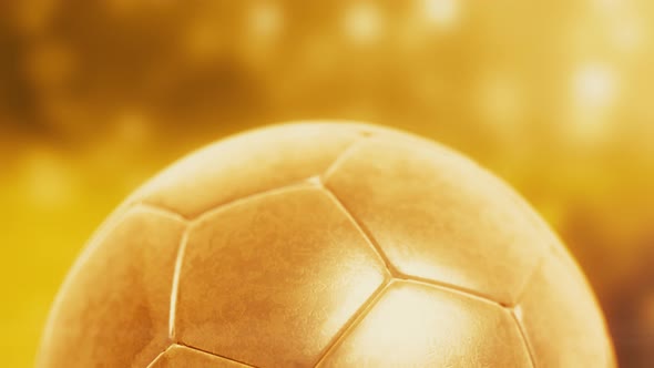 Gold spinning soccer football