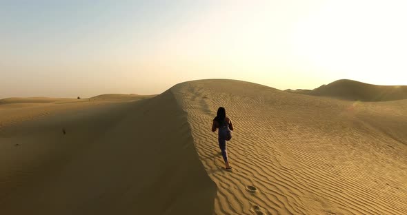 Girl Is Training in the Desert