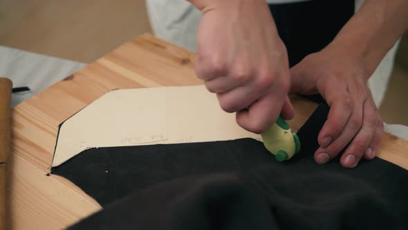 Man Cut Natural Leather with Knife, Craftsman Close Up Macro Produce Shoes Bag Hands alt