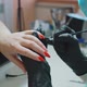 Manicure. Services of a master on manicure. The manicurist paints his nails with red gel polish. - VideoHive Item for Sale