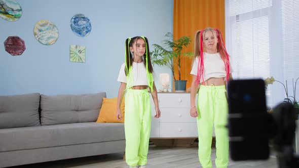 Children Bloggers Dance to Music at Home in Front of Mobile Phone Girlfriends Shoot Videos for alt