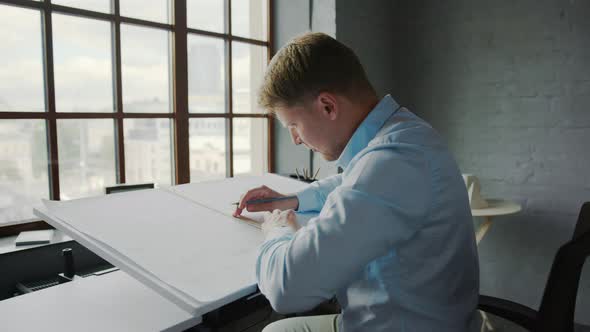 Working engineer in office alt