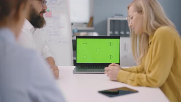 People Using Green Screen Laptop