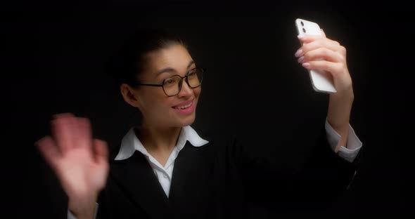 Business Woman is Talking on a Video Call