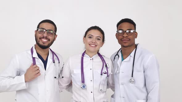 Medical students from different countries on a white background. alt