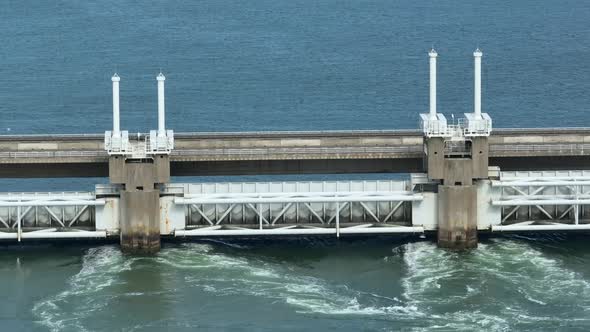 Sea Water Rushing Through a Storm Surge Barrier alt